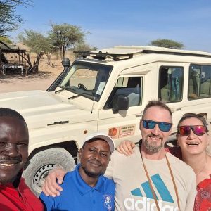Johari Africa Adventures guests with our guide on safari - book the best Kenya luxury safari tour packages from Nairobi, Diani, Mombasa, Malindi and Watamu - www.johariafricaadventures.com