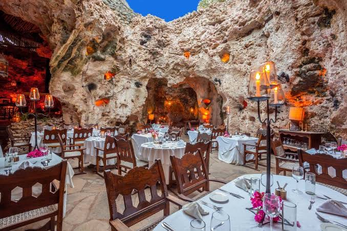 A magical fine dinning at Ali Barbour's Cave Restaurant in Diani- one of the best things to do in Diani beach with Johari Africa Adventures